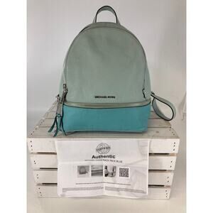 MICHAEL KORS, LARGE PEBBLED LEATHER BLUE BACKPACK WITH TAGS